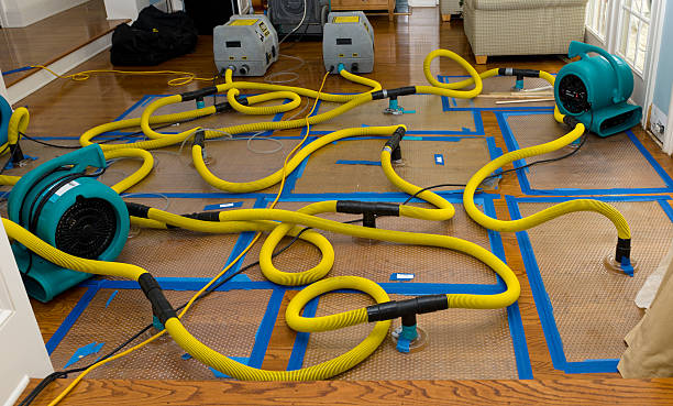 Professional Flood Damage Restoration technician working in Grand Haven, MI